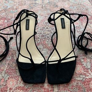 Strappy black classy sleek open toed heels